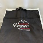 Suit garment bag with a zipper